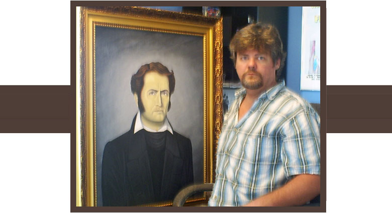 Local Artist Mark Barnett poses with his latest portrait of James Bowie in his home studio.